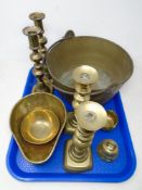 A tray containing antique and later brass ware including a cast iron handled jam pan,