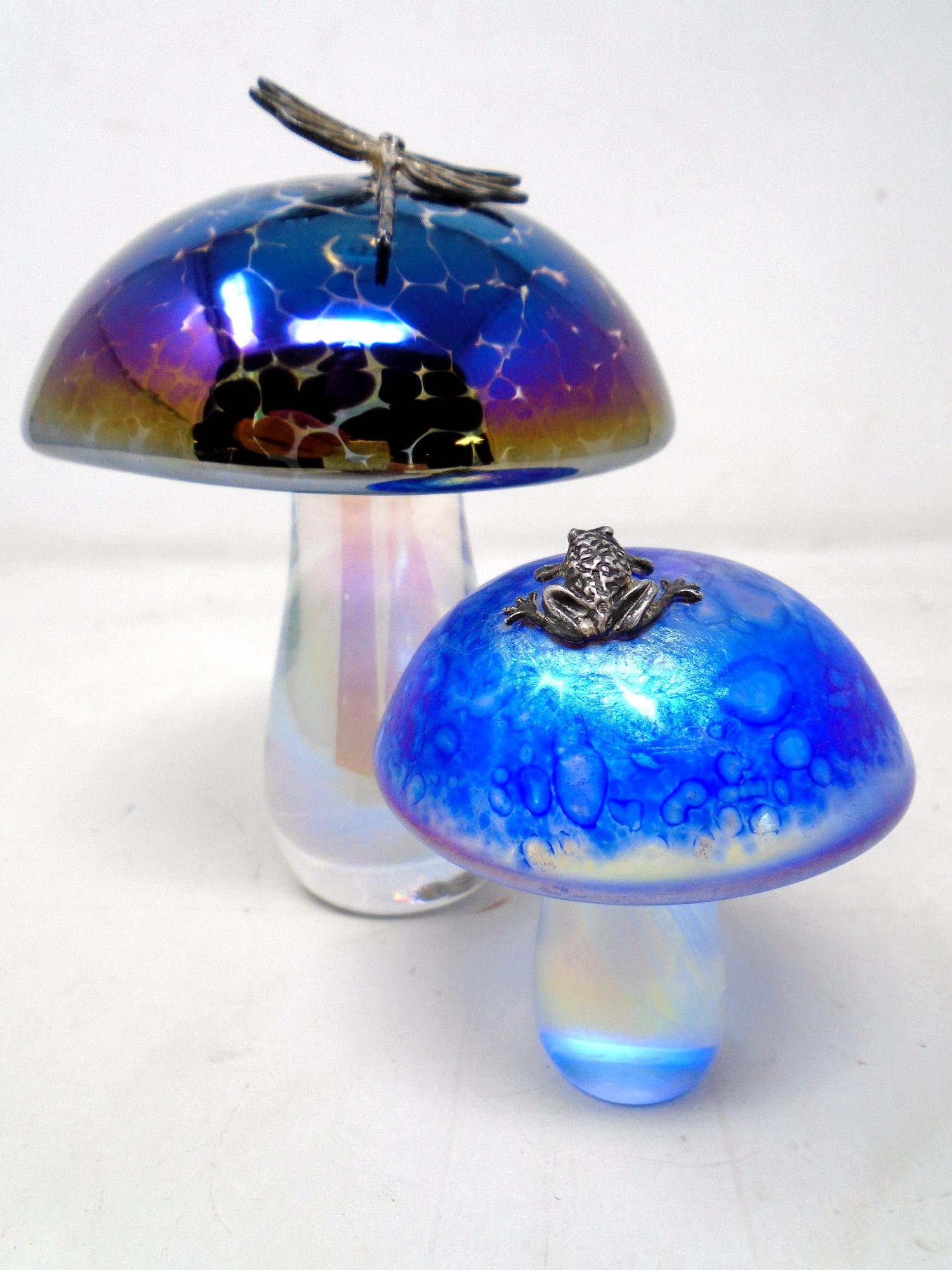 A John Ditchfield Glasform iridescent glass mushroom paperweight with applied silver dragonfly,