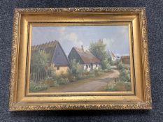 A box containing Continental school oil-on-canvases including flowers, rural village scenes,