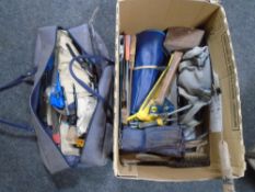 A box and bag containing hand tools, hand saws,