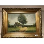 Continental school : a thatched cottage by a lake, oil on canvas,