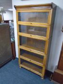 An Edwardian oak five-section stacking bookcase.