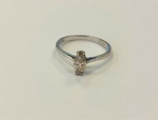 An 18ct white gold marquise shaped diamond ring, 1.9g, size M, approximately 0.2ct.