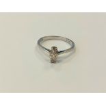 An 18ct white gold marquise shaped diamond ring, 1.9g, size M, approximately 0.2ct.