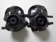 Two gas masks.