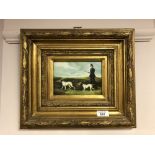 A gilt framed over painted print depicting huntsman with two dogs,