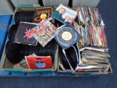 Two boxes containing a large quantity of vinyl 7" singles including XTC, The Young Ones,