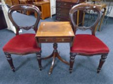A pair of Victorian balloon backed chairs together with a mahogany pedestal occasional table