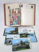 A Cardinal stamp album containing antique and later world stamps together with a small quantity of