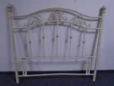 A contemporary cream and gilt metal 4'6" head board.