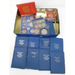 A tin containing assorted coinage including crowns, Britain's first decimal coin set,