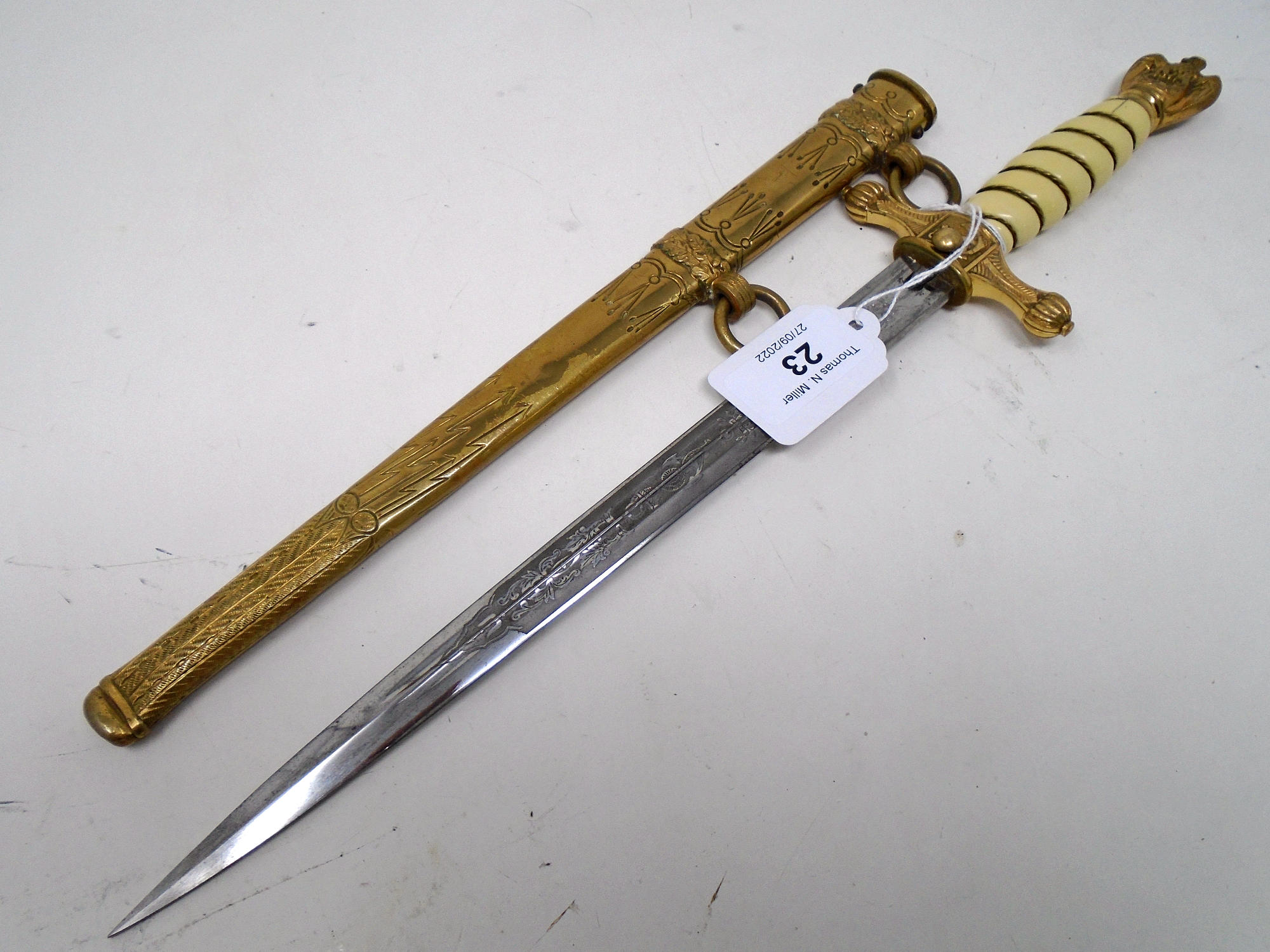 A German Third Reich Kreigsmarine dagger by Eickhorn, maker's logo to the blade,