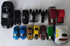 A collection of Matchbox, Hotwheels and Corgi model cars.