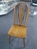An elm and beech Windsor dining chair