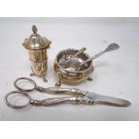 A London silver salt on raised legs together with a silver mustard spoon,