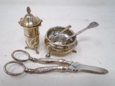 A London silver salt on raised legs together with a silver mustard spoon,