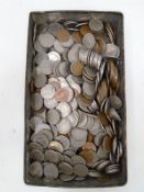 A vintage tin containing a large quantity of pre-decimal coinage including Georgian and Queen