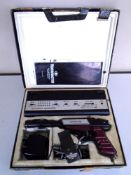 A vintage Videomaster Superscore with gun, leads and instructions in original box.