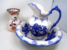 A blue and white glazed pottery wash jug and basin together with Mason's Mandalay pattern vase.