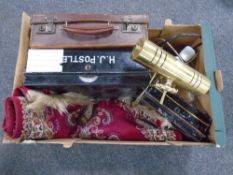 A box containing brass banker's desk lamp, metal deed and cash box,