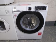 A Hoover H-Wash 500 9kg washing machine.