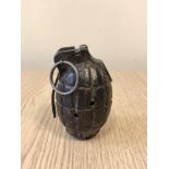 A Mk I hand grenade (drilled out and rendered inert)