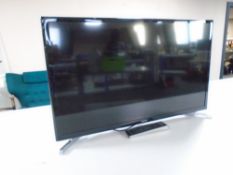A Samsung 32" LED TV with remote (continental wiring).