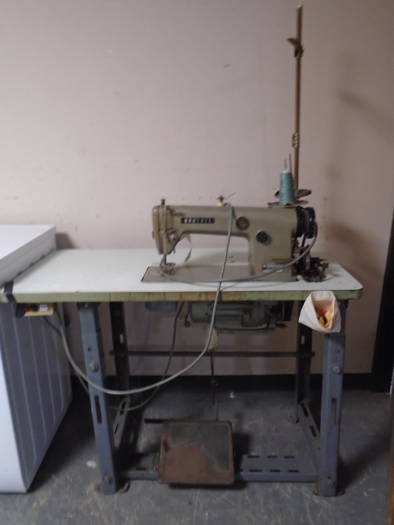A Brother DB2-B755-3 industrial sewing machine in table.