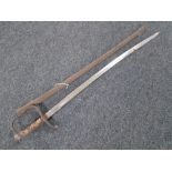 A 19th century naval sword in sheath.