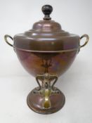 A 19th century brass and copper samovar with tap.
