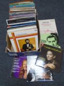 A box containing vinyl LPs including classical, jazz etc.