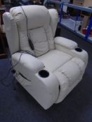 An electric reclining massage chair with cup holders