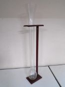 A glass yard of ale on stand.