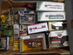 A box containing boxed and unboxed die cast vehicles including Atlas, Eddie Stobart, Corgi classics,