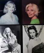 Photos of Marilyn Monroe, Veronica Lake, and Maureen O'Hara, with some press stamps on verso.