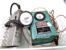 A vintage Popular battery charger together with a torch.