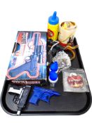 A tray containing Black Widow slingshot together with ball bearings, bb gun pellets,