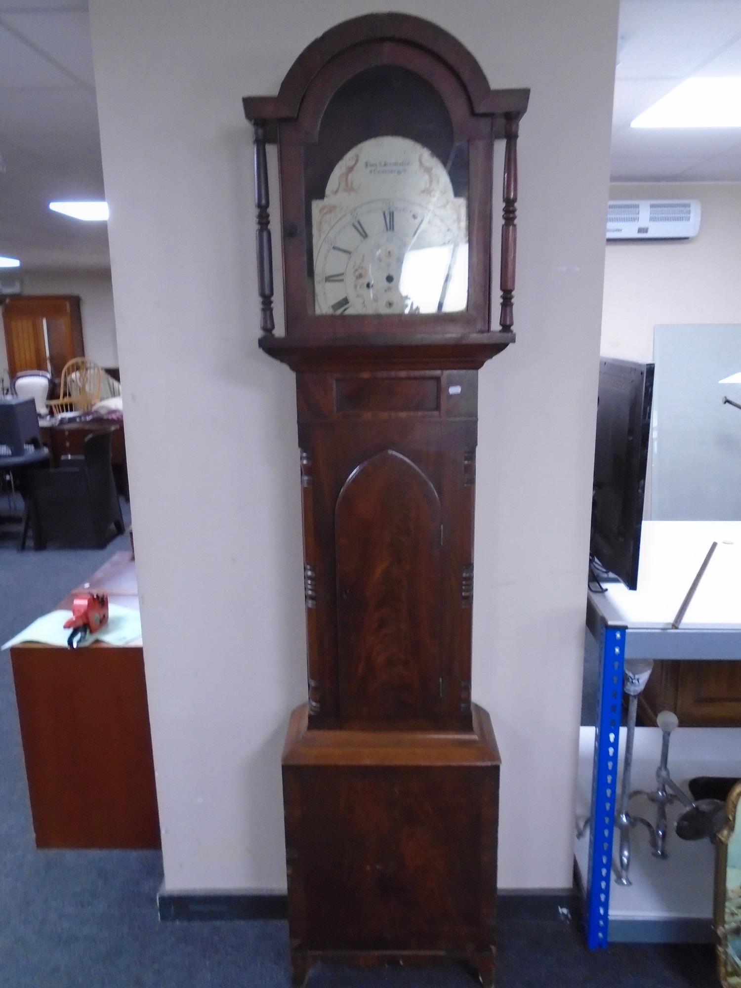 A 19th century mahogany longcase clock case with painted dial signed Thos S Howlette,