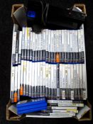 A Sony Playstation 2 with power lead and approximately 55 assorted games.