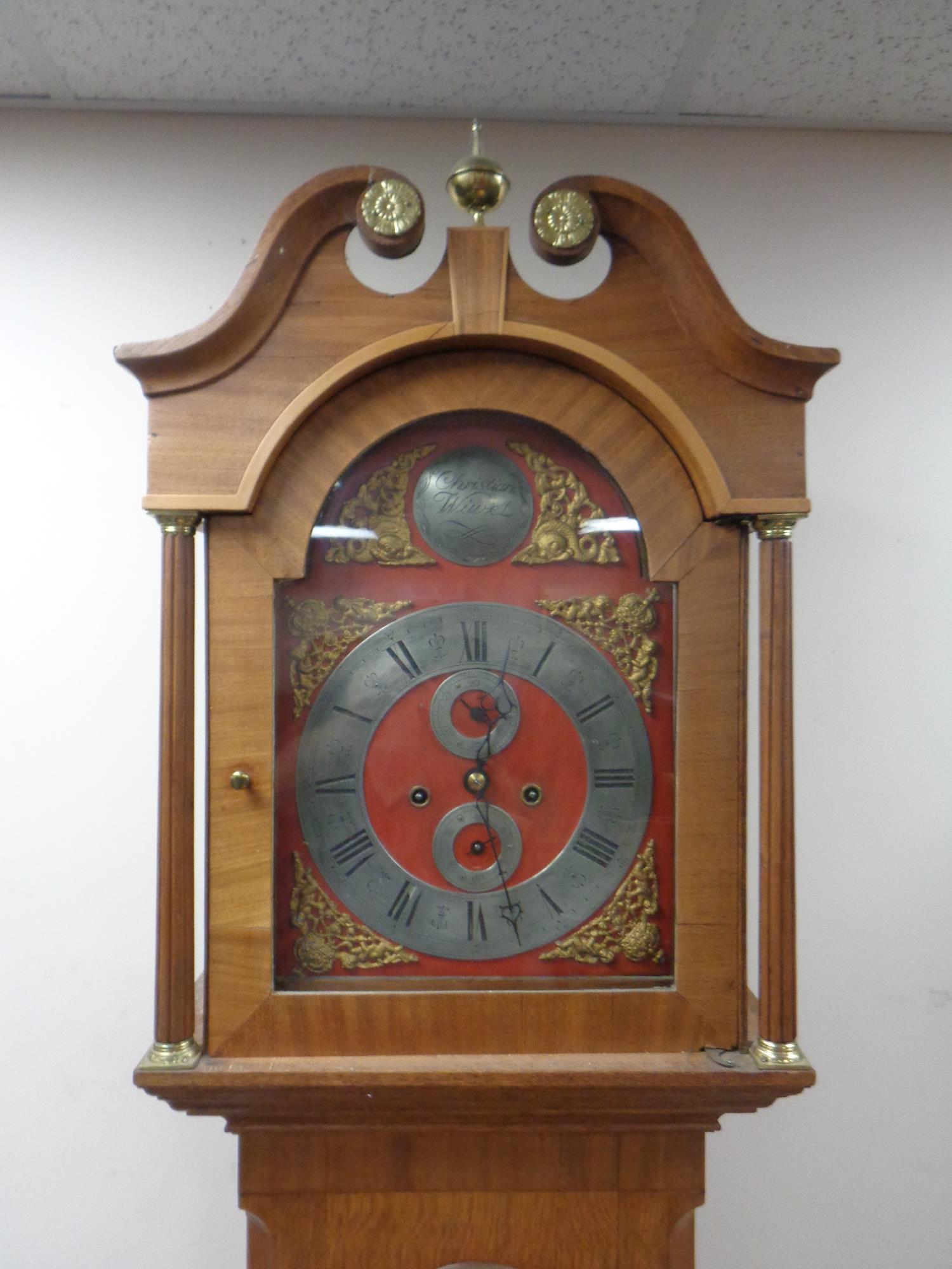 A continental oak longcase clock with brass and silver dial signed Christian Wiuvel with pendulum - Image 2 of 2