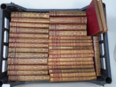 A set of 18 leather bound gilded volumes, Alexandre Dumas, together with 14 further volumes,