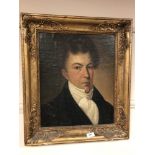 A 19th century portrait of a gentleman, an over painted print,