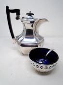 A silver plated coffee pot together with a silver plated sugar bowl with blue glass liner and
