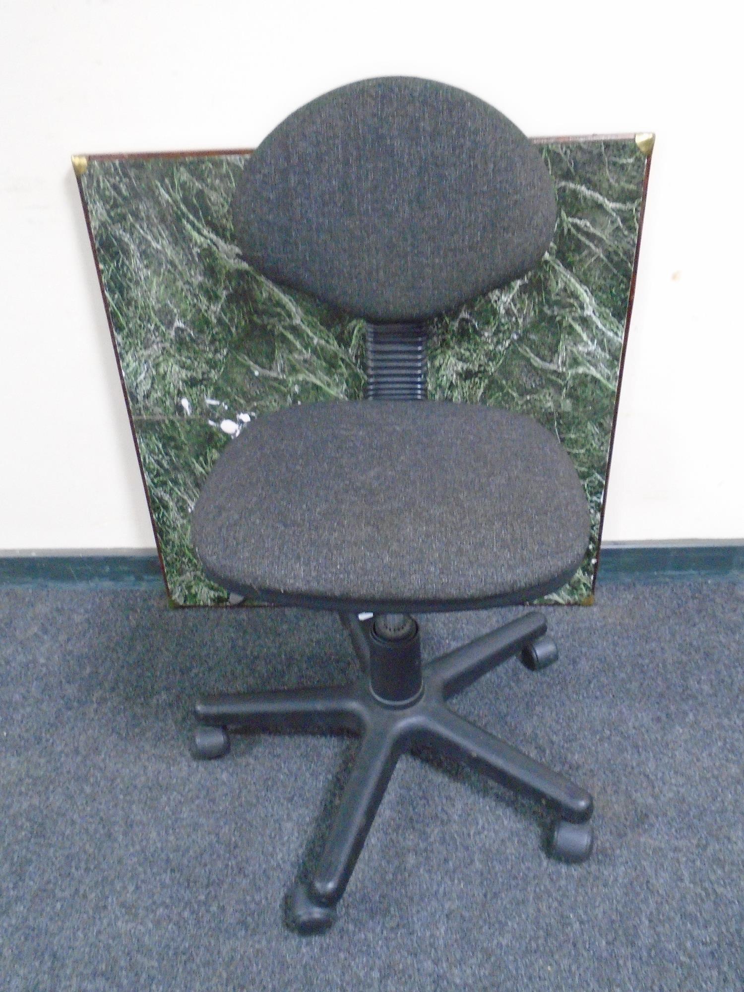 A swivel typist chair together with a folding card table