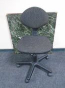 A swivel typist chair together with a folding card table