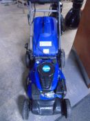 A Hyundai HYM51SPE electric start self drive lawn mower with key and grass box.