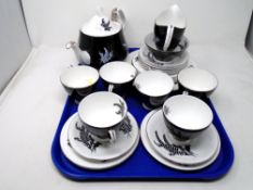 A set of 22 pieces of Royal Albert Night and Day bone tea china.