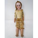 A Victorian bisque-headed jointed doll.