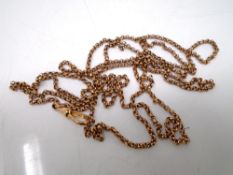A gold plated muff chain