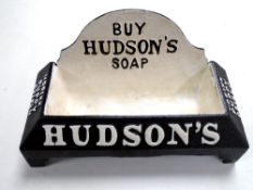 A cast iron Hudson's Soap advertising stand.